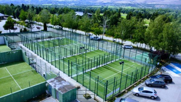 Drone photo of multiple green padel courts